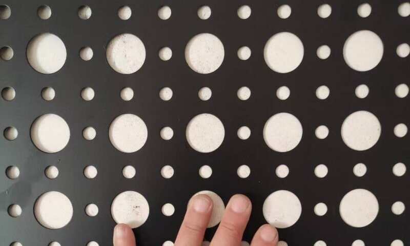 Large hole perforated plate used for industrial safety guards, offering strength and visibility