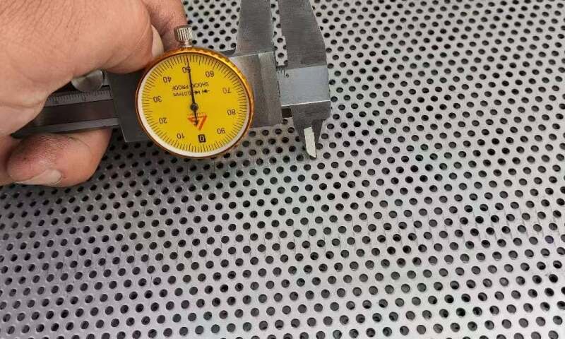 Small hole perforated plate used in air filters to trap fine particles